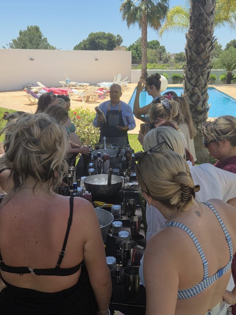 Pepe Orts leading a hen party cocktail workshop by a villa pool on the Costa Blanca